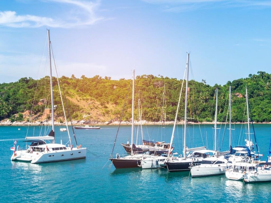 Sailboats moored at Portoverde marina near Riccione during golden hour