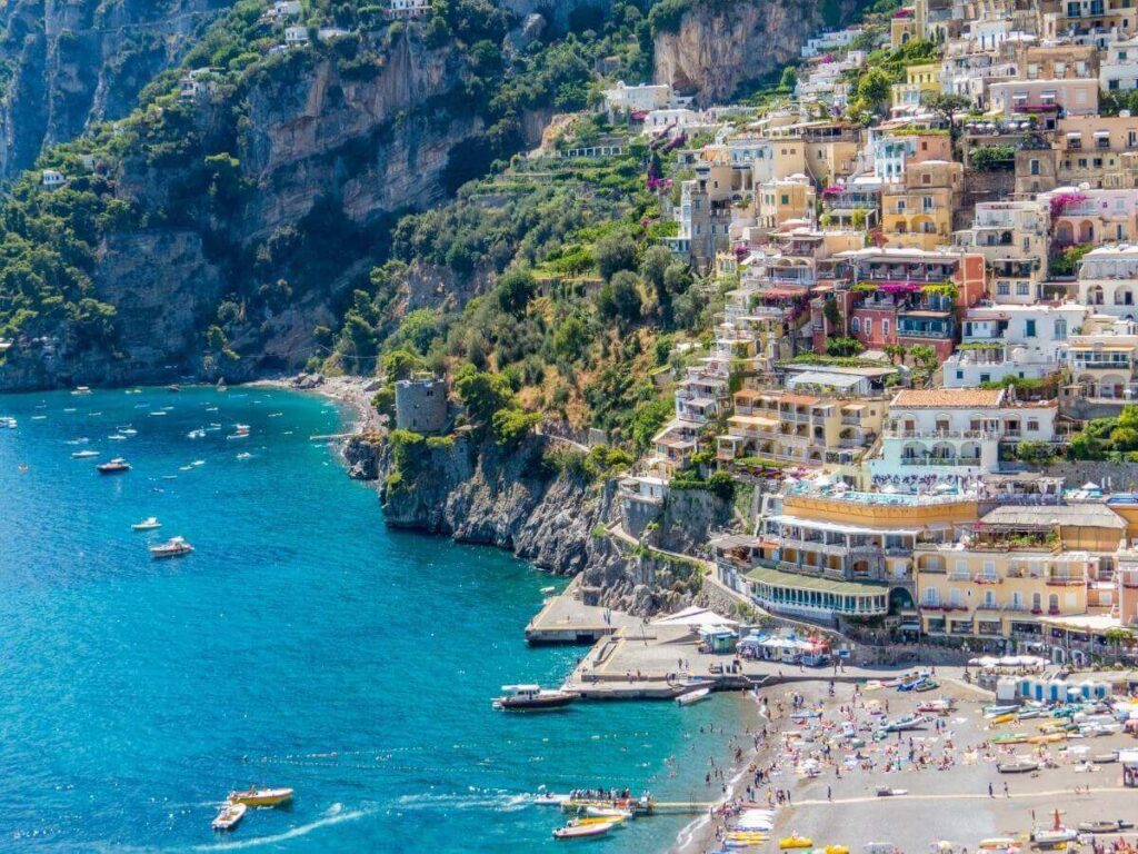 Colorful cliffside houses of Positano seen from the ferry approaching from Sorrento.