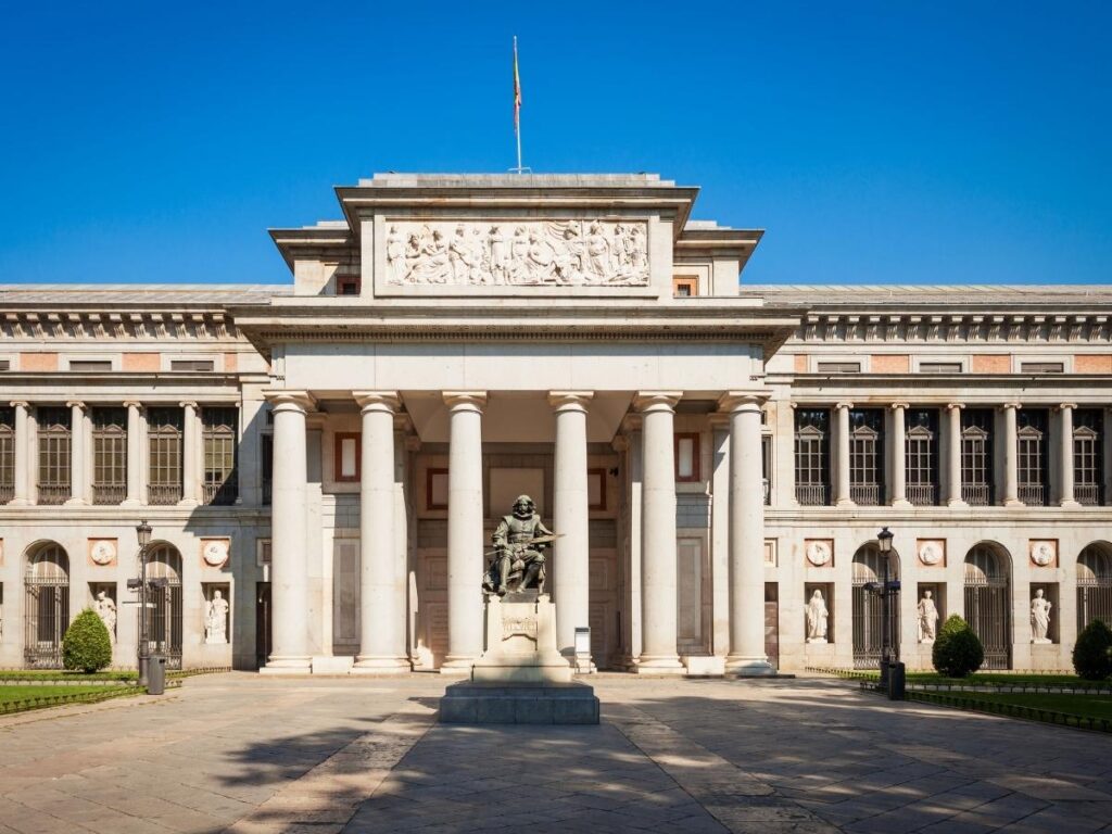 Visitors admiring masterpieces inside the Prado Museum, Madrid