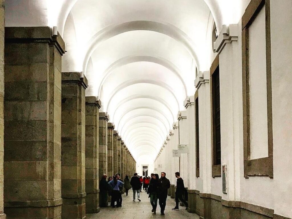 Visitors viewing Picasso’s Guernica inside Reina Sofía Museum in Madrid