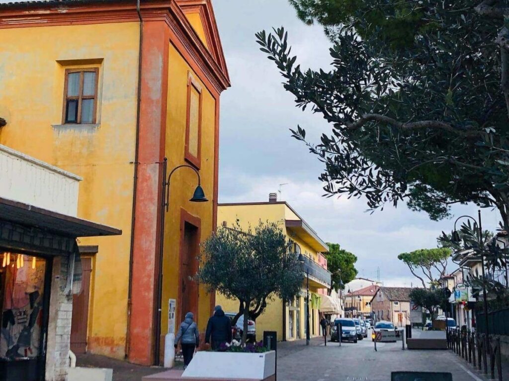 Pastel-colored houses and narrow cobblestone streets in Riccione Paese old town