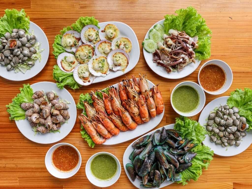 Platter of grilled fish, shrimp, and calamari drizzled with olive oil, Rimini.