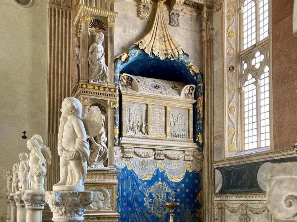 Interior detail of Tempio Malatestiano showing marble and frescoes, Rimini.