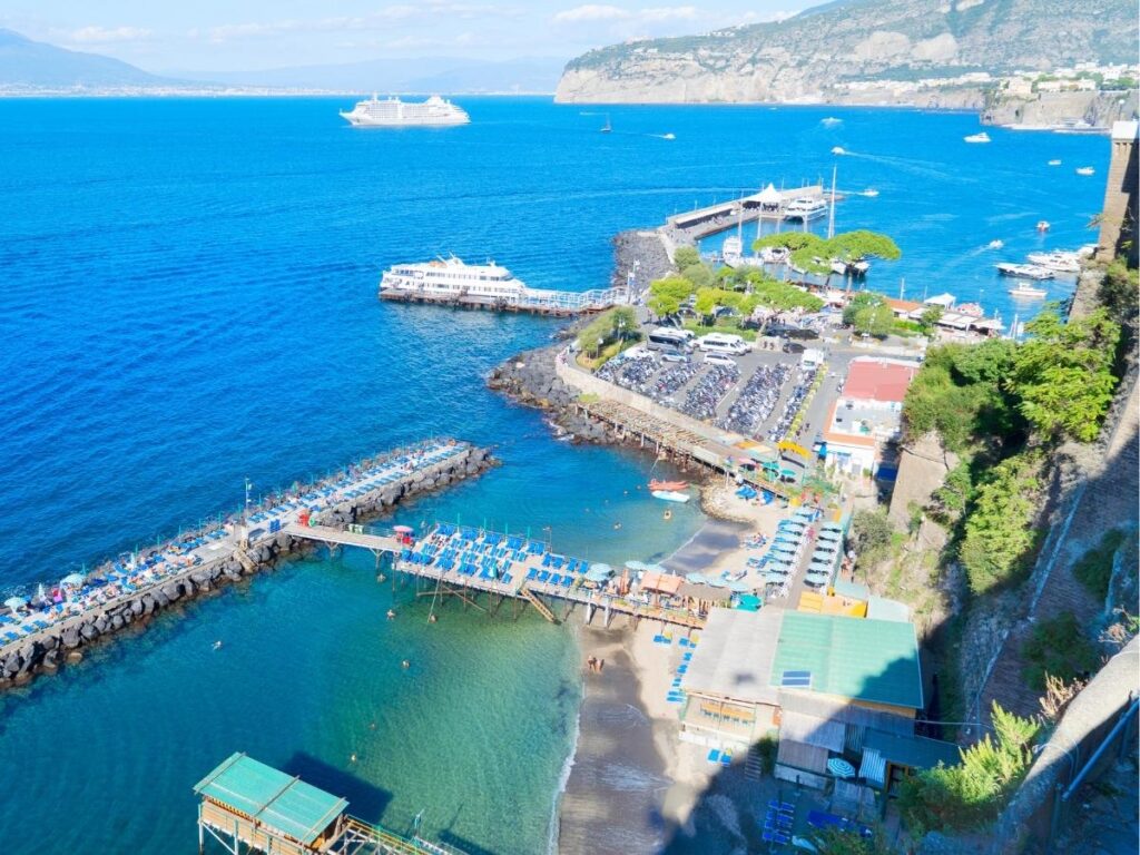 Terrace in Sant’Agnello with panoramic view of the Bay of Naples and Mount Vesuvius at sunset.
