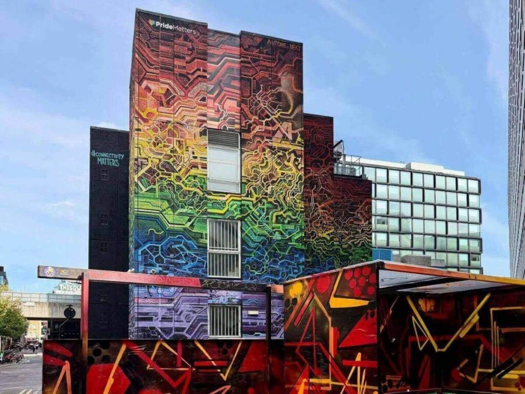 Colorful street art mural in Shoreditch, East London.