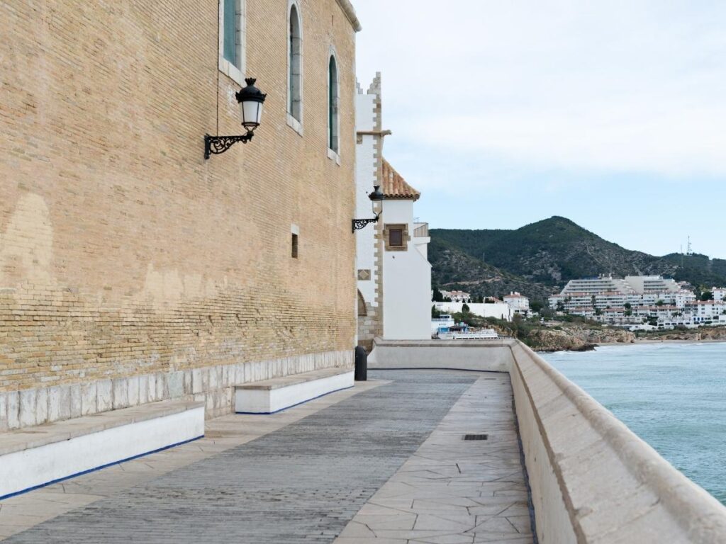 Whitewashed streets and beach in Sitges