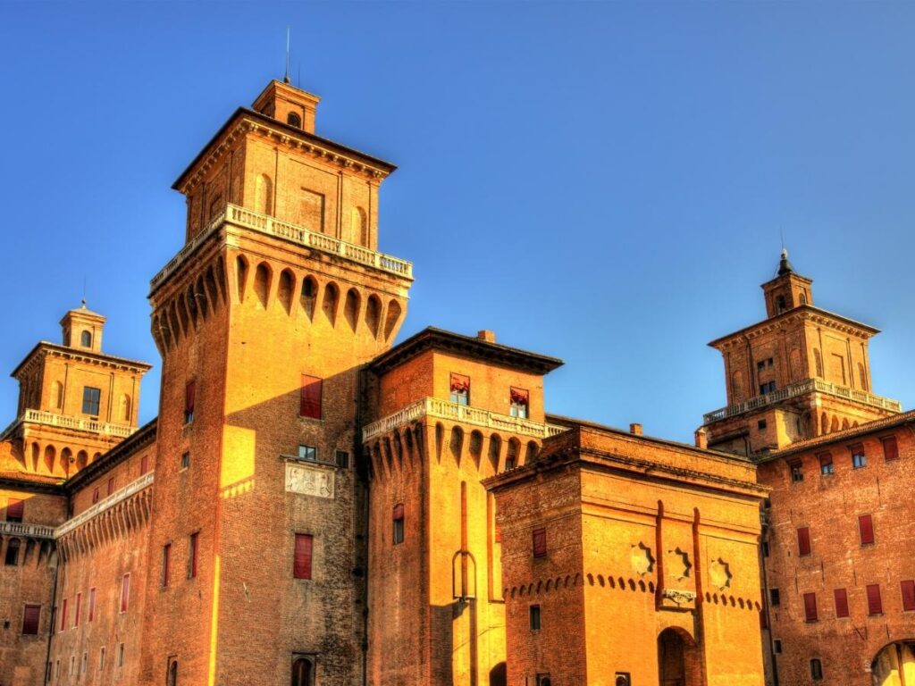 Castello Reale di Sarre interior with antlers and hunting trophies lining the walls and valley views from the windows.