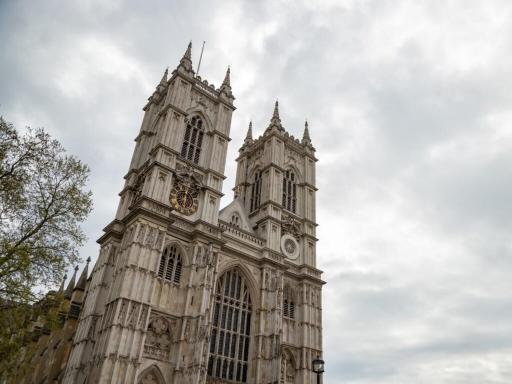 “View of Westminster Abbey and Big Ben on a sunny morning in London.”