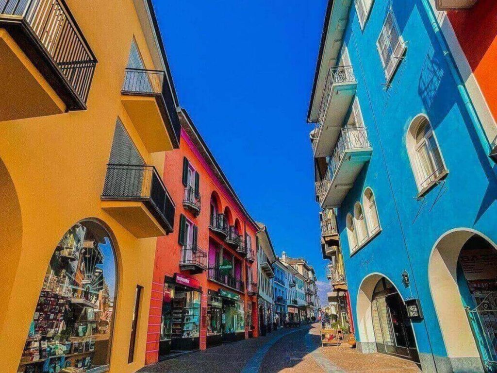 Narrow cobbled lane in Ascona’s Borgo old town with small cafés and boutiques