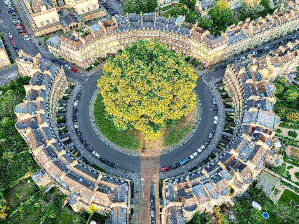 Central Bath street lined with shops, restaurants, and small hotels, all within easy walking distance