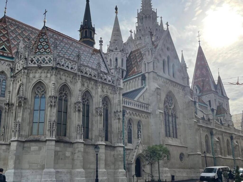 Cobbled streets and colorful houses in Budapest’s Castle District with panoramic city views