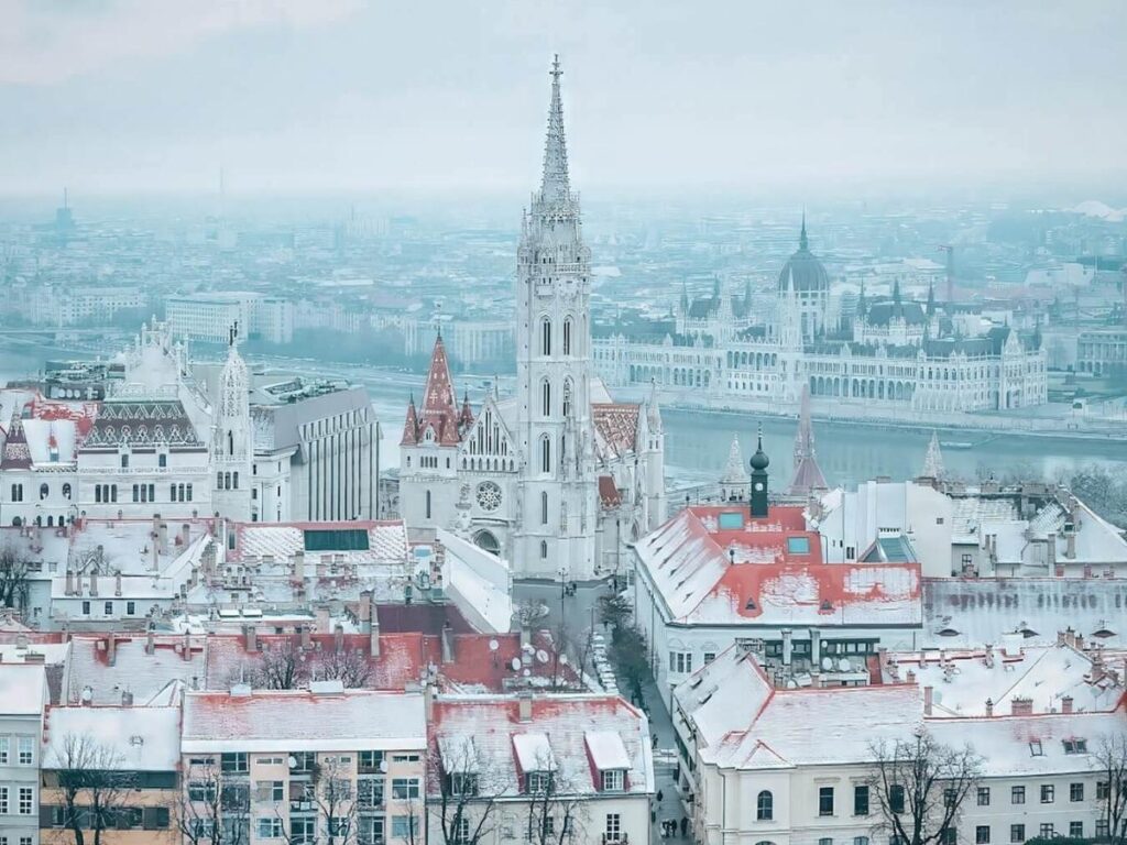 Budapest Christmas market stalls decorated with lights during winter