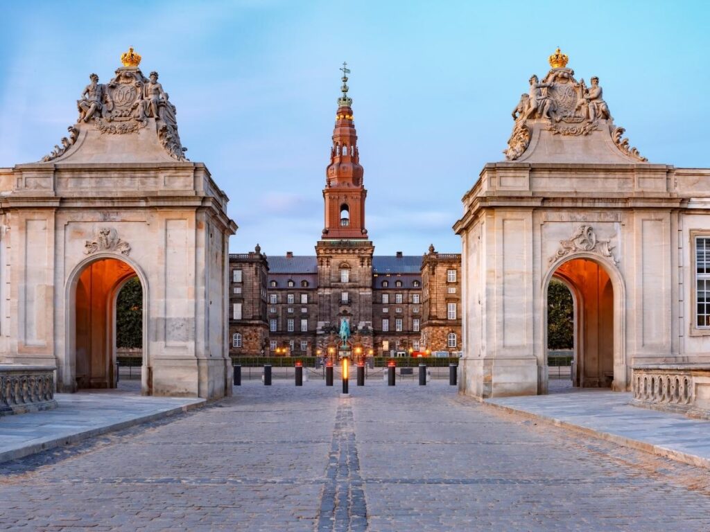 Aerial view over Copenhagen from the Christiansborg Palace tower at sunset.