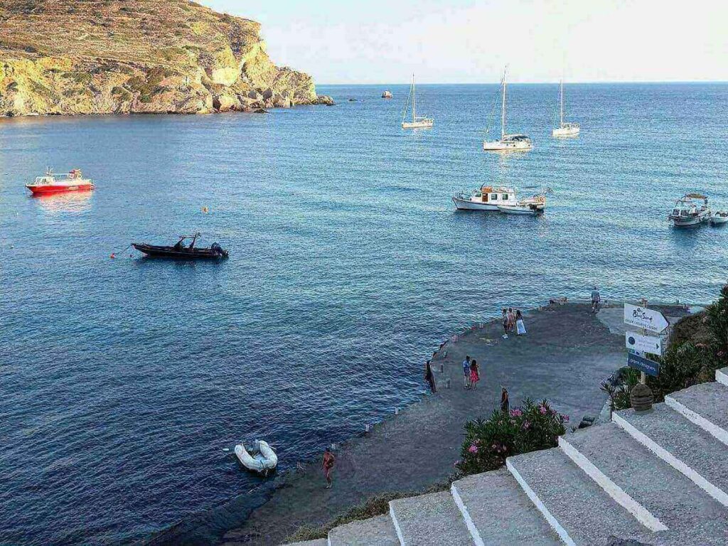 Ferry approaching Karavostasis port in Folegandros on a clear morning