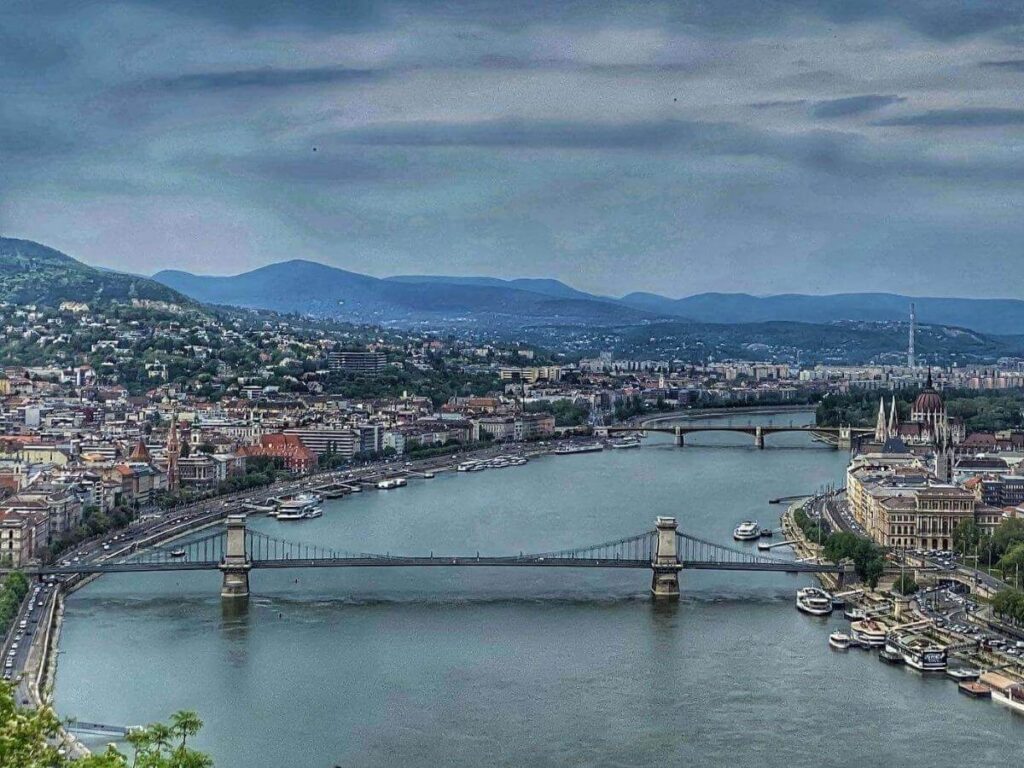 Wide panoramic view of Budapest and the Danube River from Gellért Hill