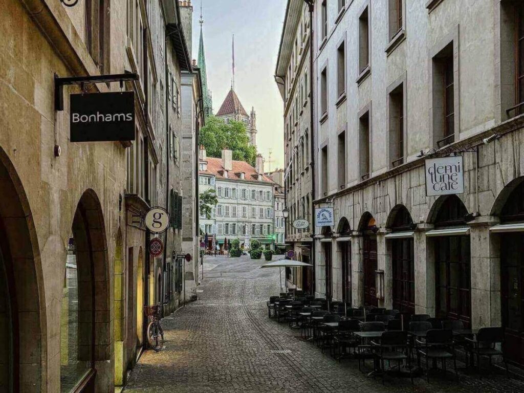 Modern, bright hotel room near Geneva’s Cornavin station with simple decor