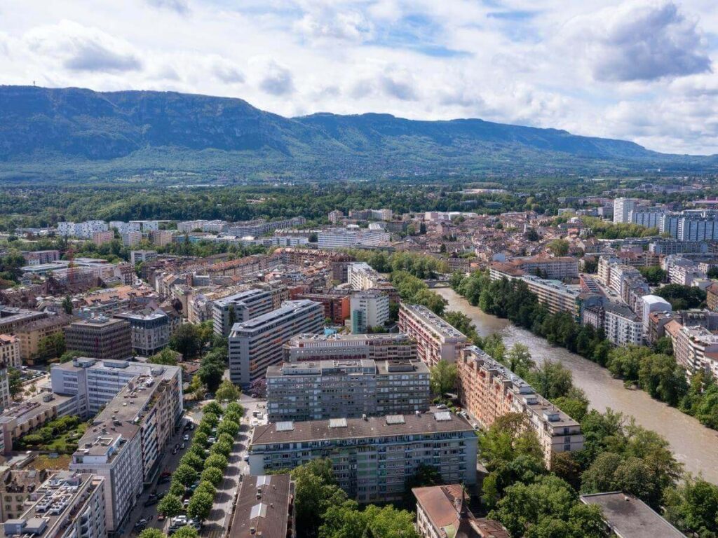 Vendors and shoppers at the Plainpalais open-air market in Geneva