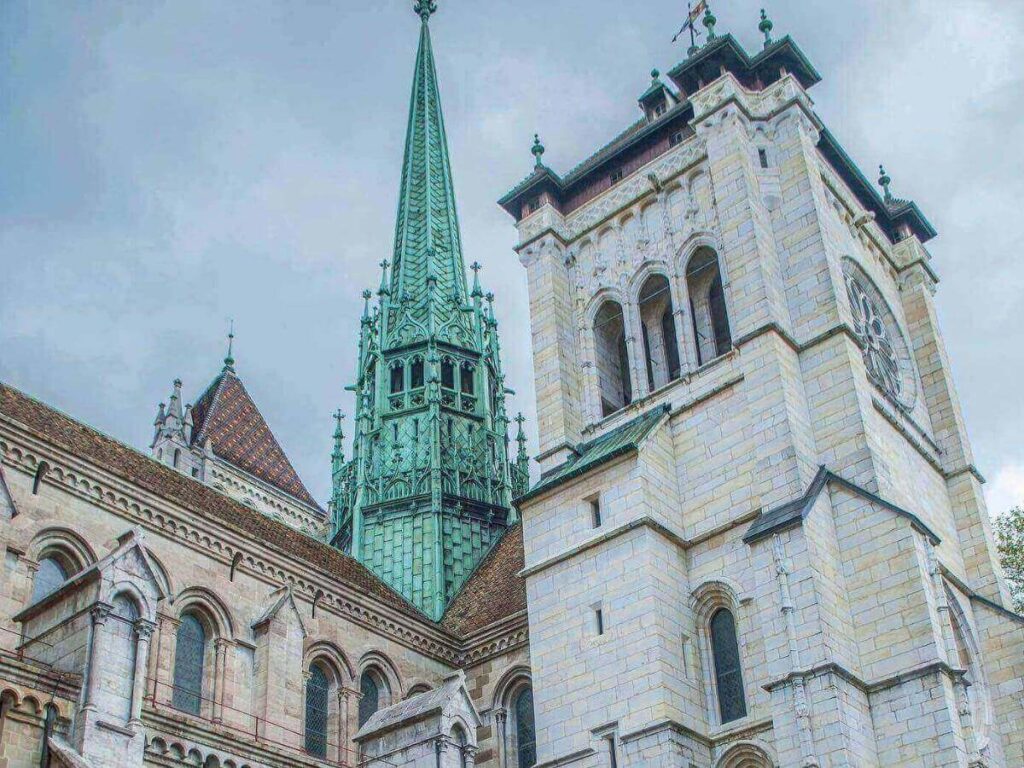 View across Geneva’s rooftops and Lake Geneva from the St-Pierre Cathedral tower