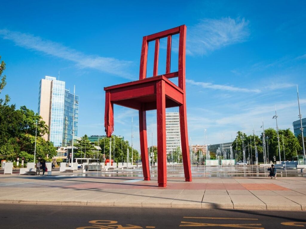 The Broken Chair sculpture with the Palais des Nations in the background