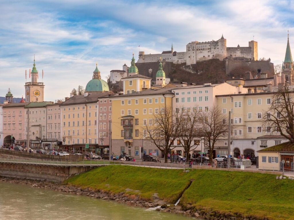 Panoramic view of Salzburg rooftops and mountains from Hohensalzburg Fortress