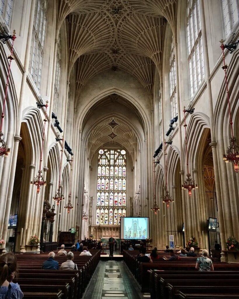 Fan-vaulted ceiling inside Bath Abbey with soft natural light highlighting the stonework