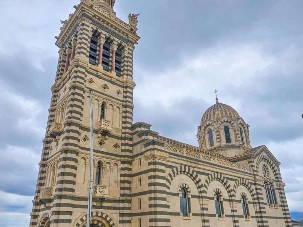 Panoramic view of Marseille from Notre-Dame de la Garde showing the port, rooftops and Mediterranean coastline