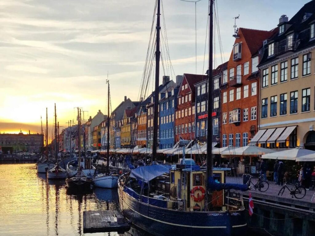 Colorful 17th-century buildings and waterfront cafés at Nyhavn, Copenhagen