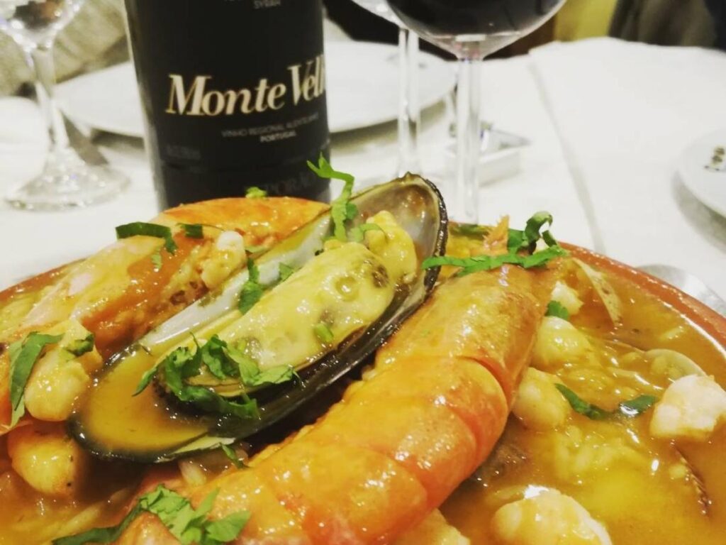 Octopus with sweet potato and olive oil at O Horta restaurant near Olhão waterfront, Portugal