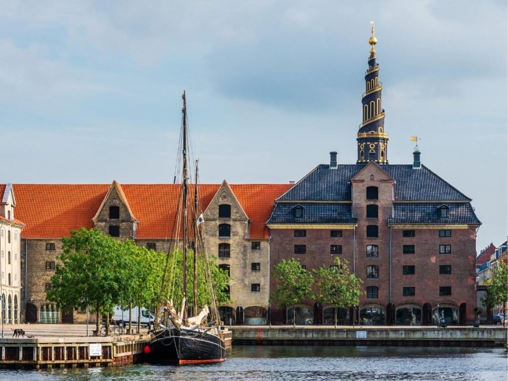 Spiral tower of Our Saviour’s Church rising over the canals of Christianshavn, Copenhagen.