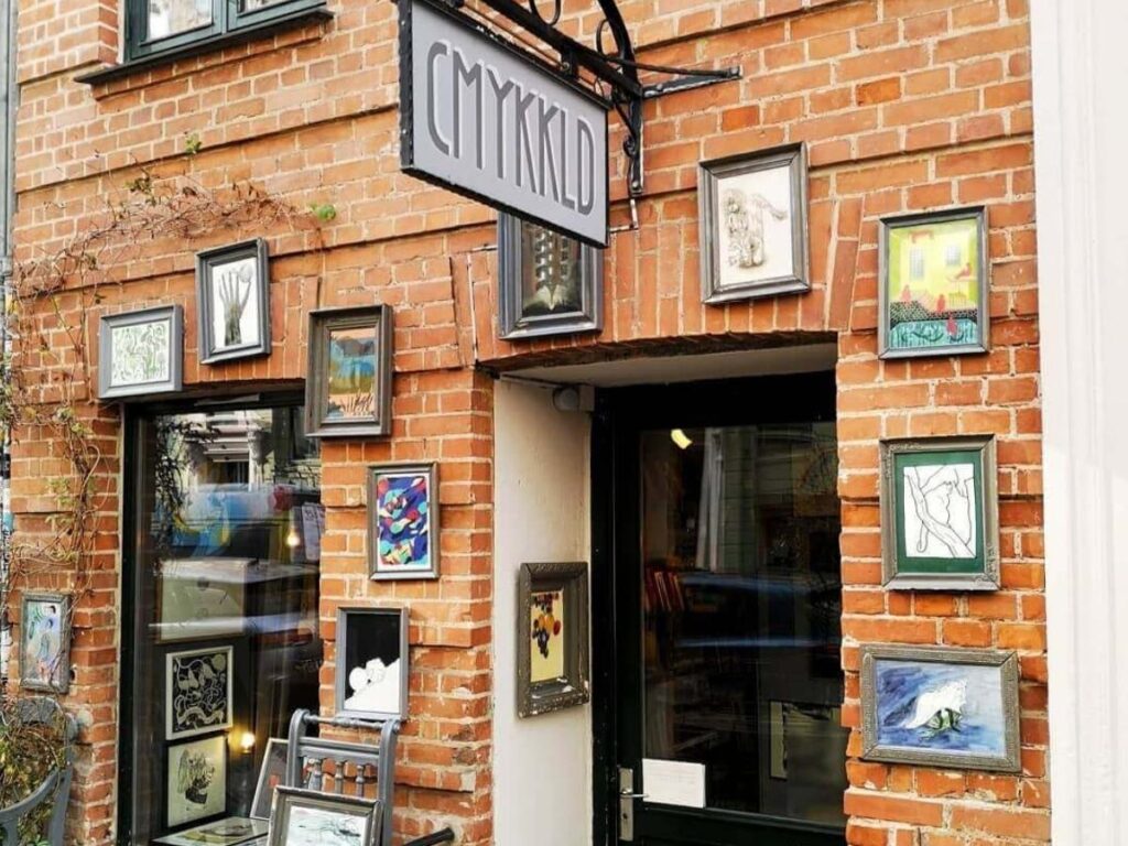 Cafés and vintage shops along Jægersborggade Street in Nørrebro, Copenhagen.