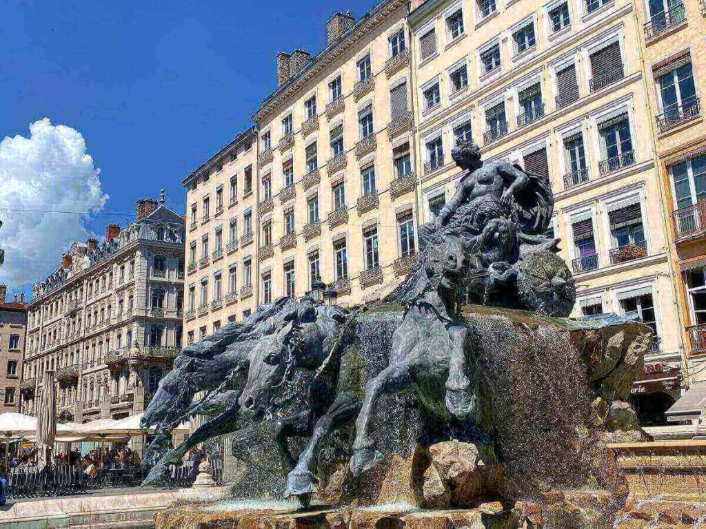 Bartholdi Fountain at Place des Terreaux with Lyon’s Hôtel de Ville in the background.
