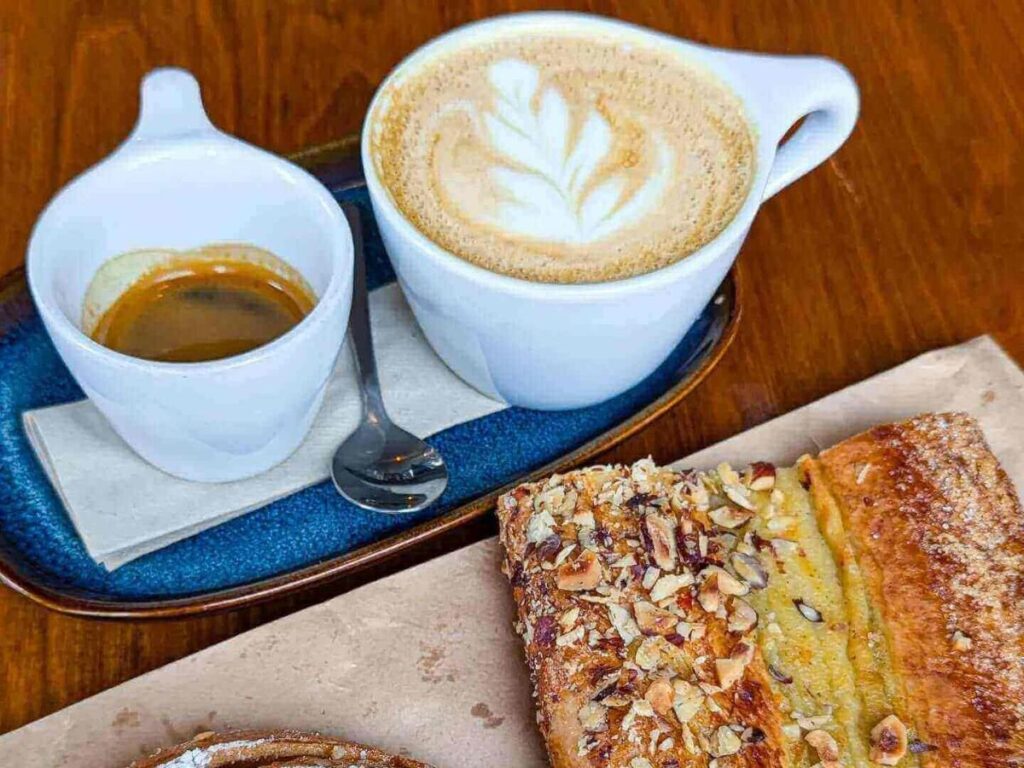 Cup of specialty coffee inside Reykjavík Roasters on a quiet morning