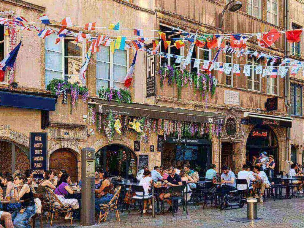 Riverside path along the Rhône in Lyon lined with barge cafés and walking paths