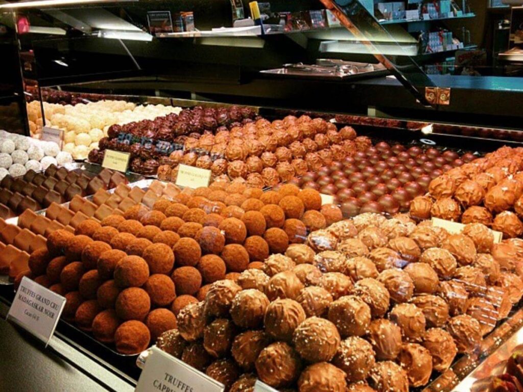 Chocolate display at Sprüngli with assorted pralines and truffles