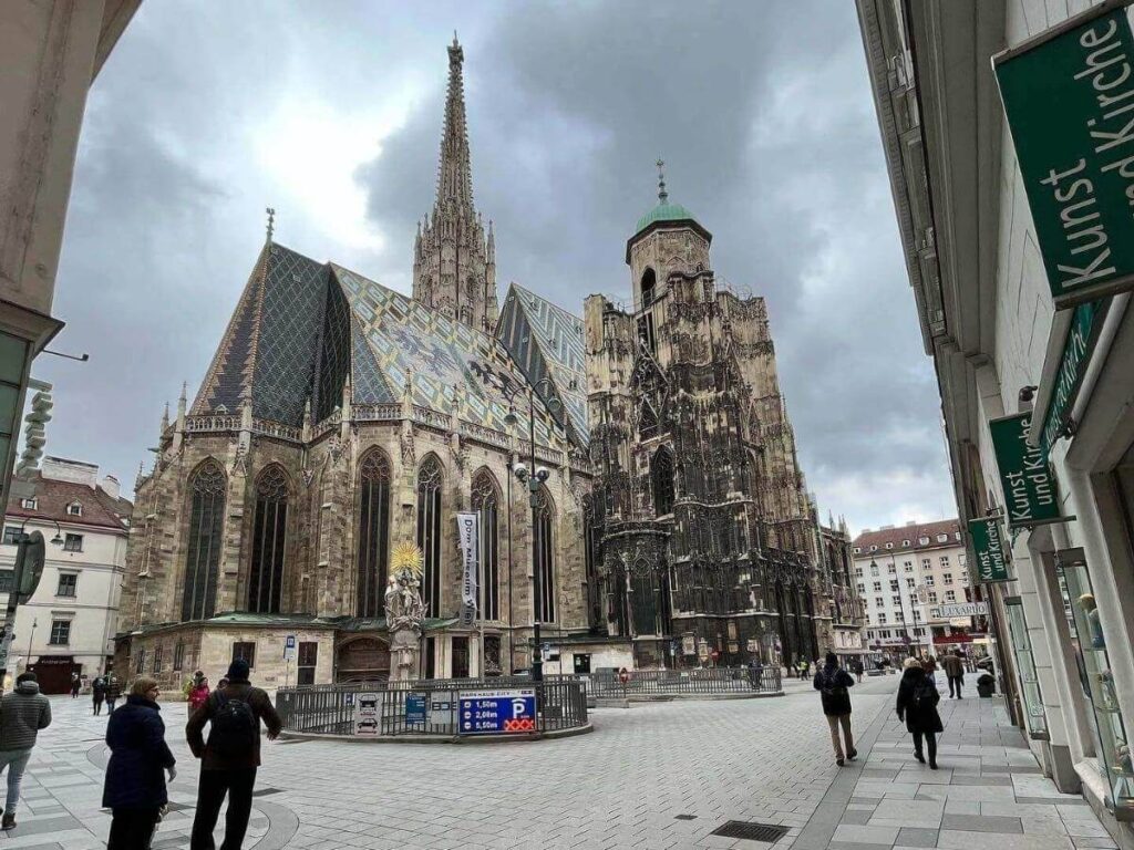 St. Stephen’s Cathedral façade and tiled roof seen from the square in morning light