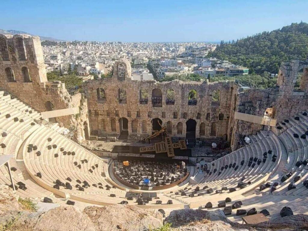 The semicircular rows of seats at the Theater of Dionysus on the Acropolis’s south slope in soft morning light