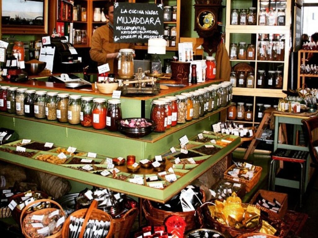 Open-faced smørrebrød sandwiches and coffee at Torvehallerne Market in Copenhagen.