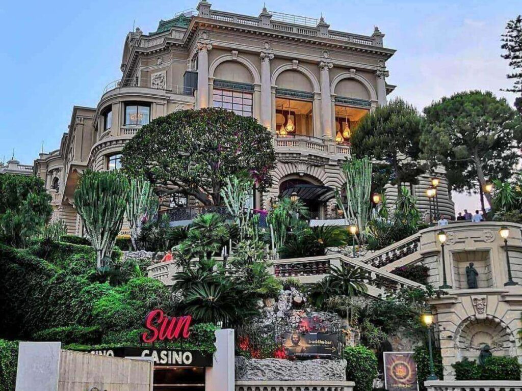 Popular photo spot in Casino Square with palm trees and the Monte-Carlo Casino