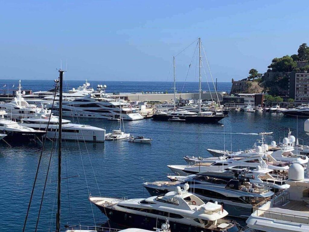 Fontvieille Marina in Monaco with calm water and boats.