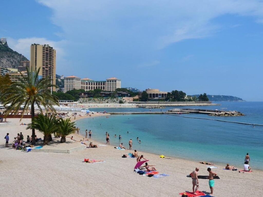 Larvotto Beach in Monaco with its modern promenade and clear water