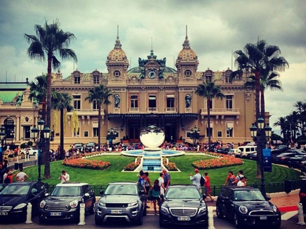 Monte-Carlo Casino and its gardens in Monaco on a sunny afternoon