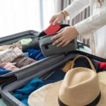 Carry-on suitcase packed with essentials for a 7-day trip