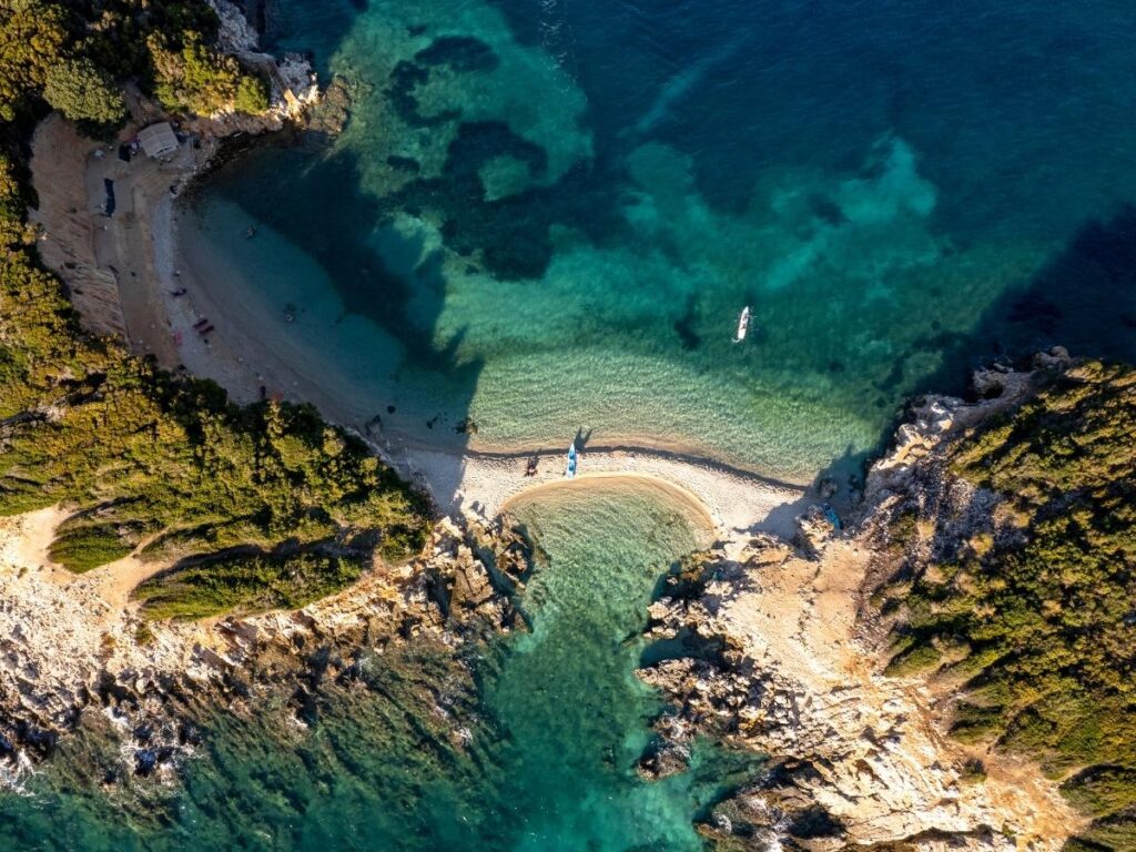 Crystal clear turquoise water at Ksamil beach on Albanian Riviera