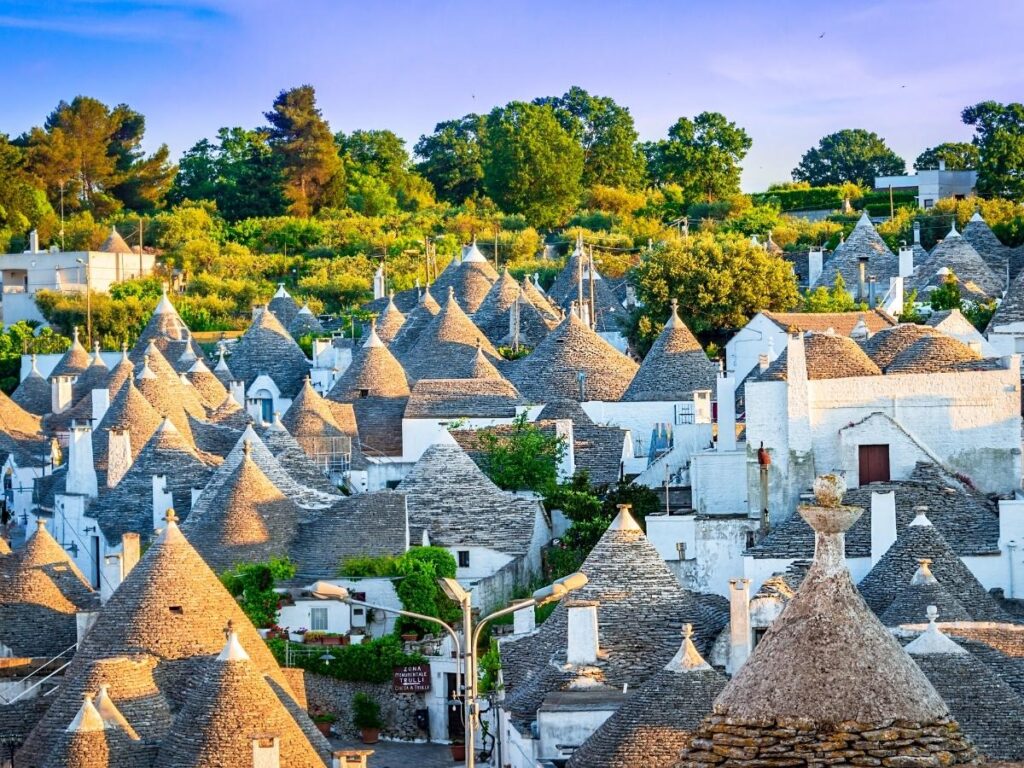 Traditional trulli houses with cone-shaped roofs in Alberobello Puglia