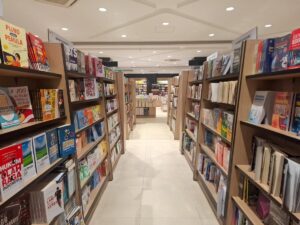 Beautiful historic bookstore interior with ornate architecture and floor-to-ceiling bookshelves