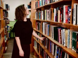 Woman browsing books at independent bookstore in New York City
