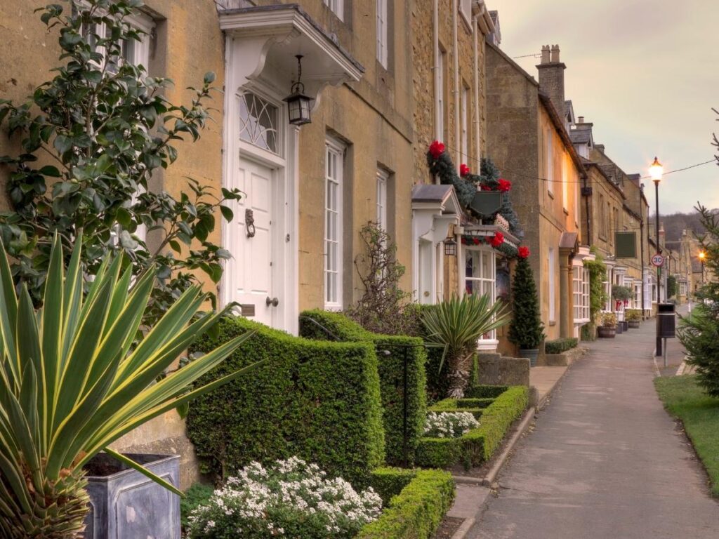  Wide main street with chestnut trees in Broadway village, Worcestershire