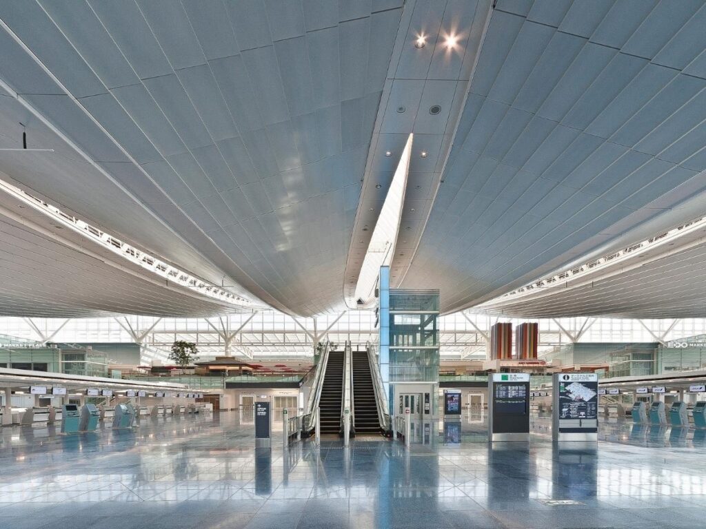 Organized travelers calmly boarding airplane at gate with plenty of time