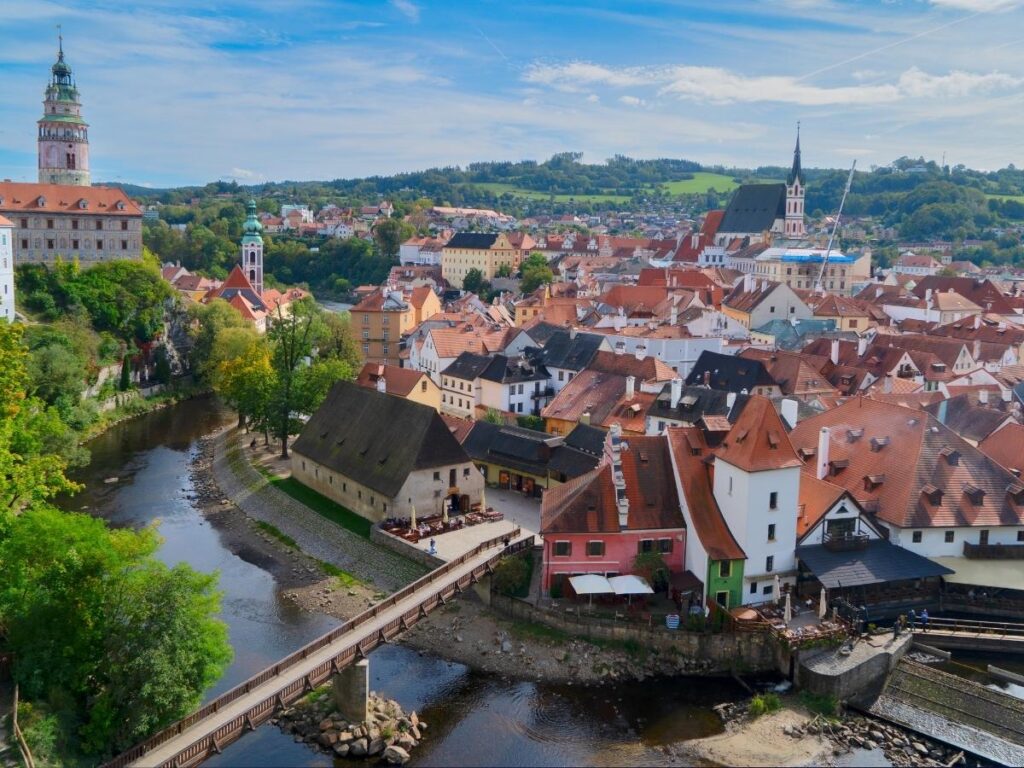 Medieval Český Krumlov Castle overlooking red-roofed old town and Vltava River, Czech Republic
