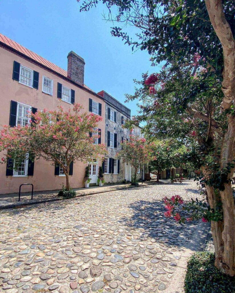 Cobblestone Chalmers Street lined with historic buildings in Charleston
